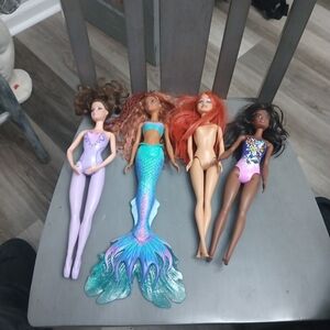 Set of Four Fashion Dolls with Colorful Outfits